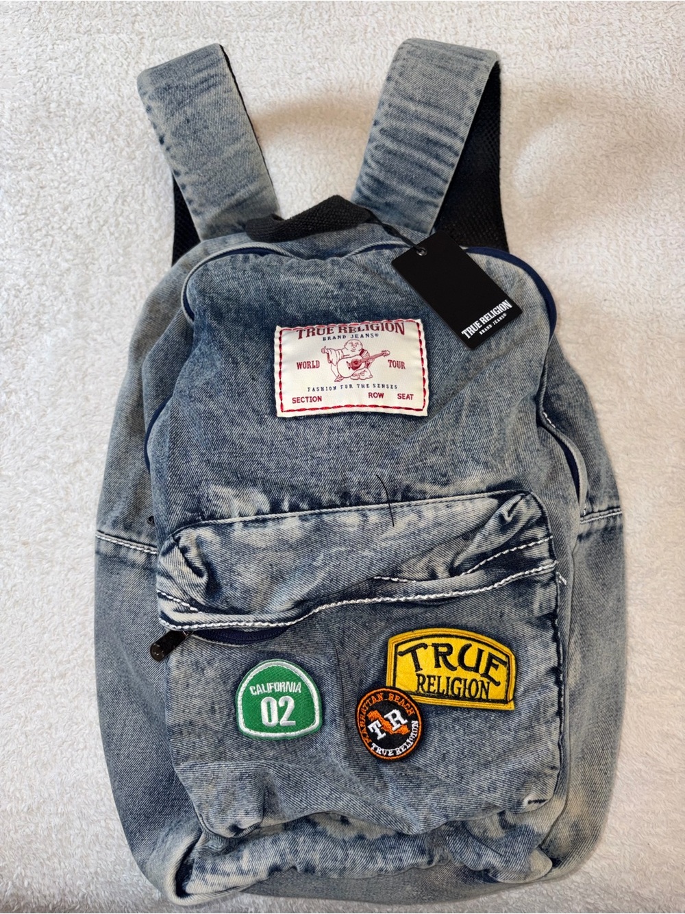 True Religion Men's Faded Denim Patch Backpack in Light Blue and Yellow